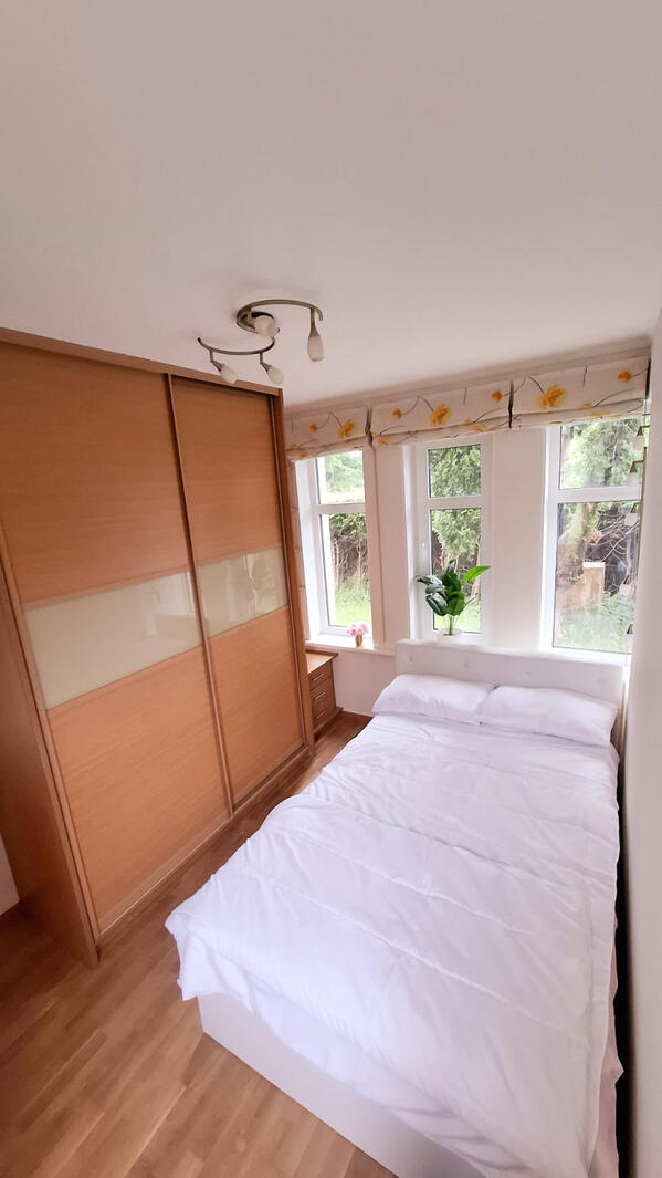 Bedroom with comfortable built in wardrobe and option to add a baby bed Bedroom with comfortable built in wardrobe and option to add a baby bed